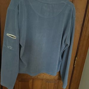 Soft sweatshirt.  Brand is Horny Toad. Longer back. Zip pocket on sleeve.